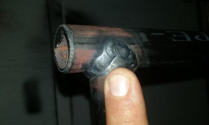 Saddle weld on 3/4" gas pipe (125 amps).